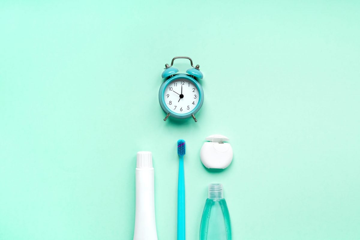 toothbrush, floss, and timer of general family dentistry specialist in Cary, NC